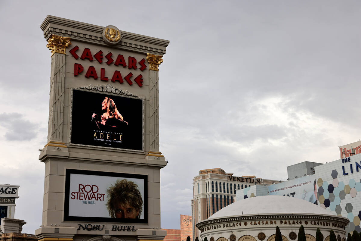 An ad announcing “Weekends With Adele” residency on the marquee at Caesars Palace ...