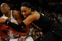 Los Angeles Sparks forward Nneka Ogwumike (30) keeps a ball away from Las Vegas Aces forward A' ...