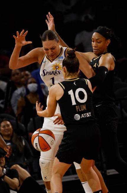 Los Angeles Sparks center Liz Cambage (1) looses a ball against Las Vegas Aces guard Kelsey Plu ...
