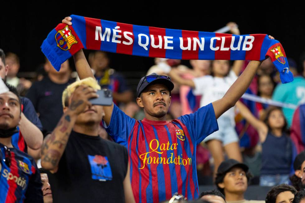Fans cheer inside Allegiant Stadium before the start of a Champions Tour soccer game between Ba ...