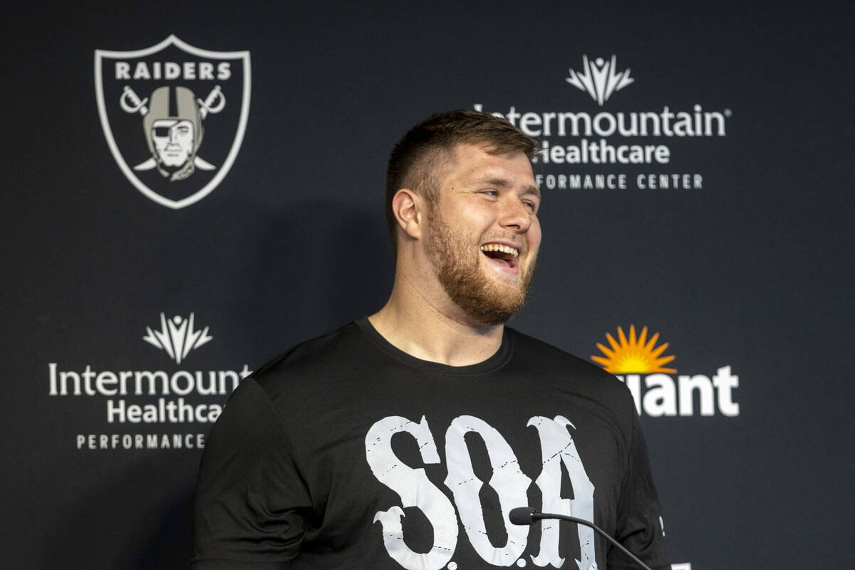 Raiders offensive tackle Kolton Miller reacts to a question asked by the media during a news co ...