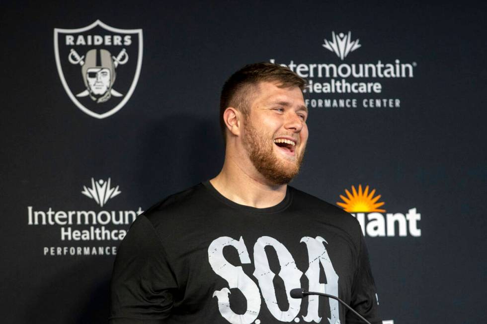 Raiders offensive tackle Kolton Miller reacts to a question asked by the media during a news co ...