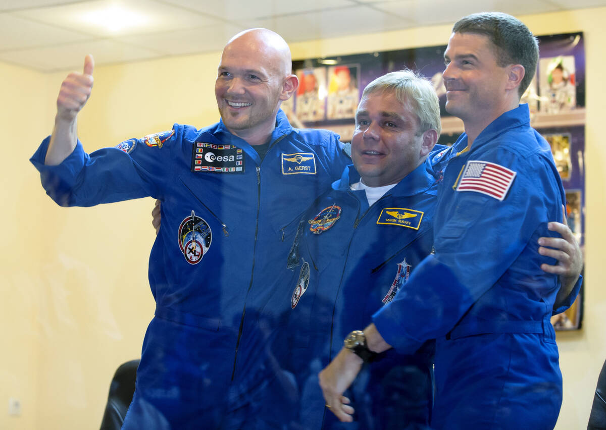 FILE - European Space Agency's astronaut Alexander Gerst, left, Russian cosmonaut Maxim Suraev, ...