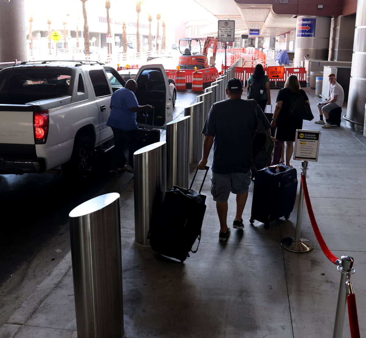 Newly installed traffic safety bollards along the check-in curb at Terminal 1 at Harry Reid Int ...
