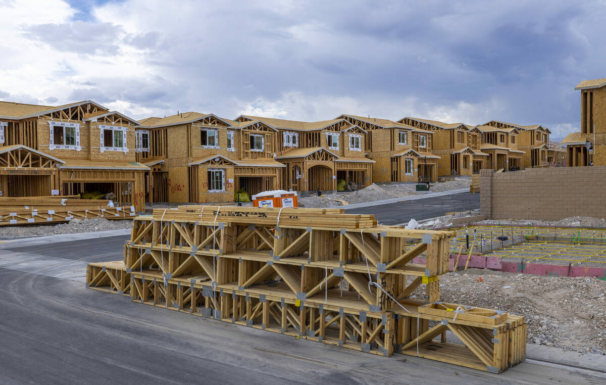 Lumber is delivered to a new property as home construction continues about Skye Canyon on Wedne ...