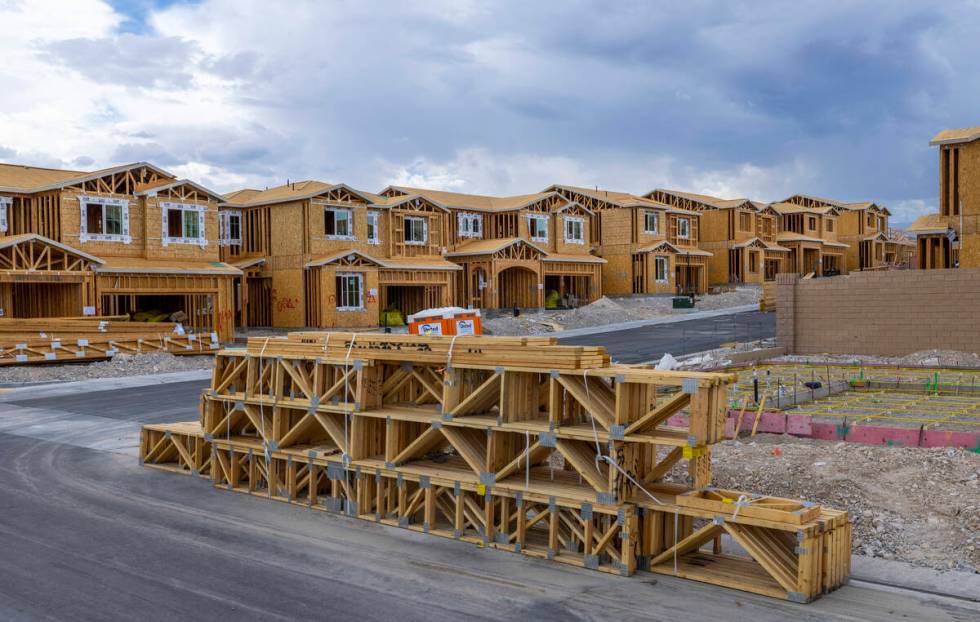 Lumber is delivered to a new property as home construction continues about Skye Canyon on Wedne ...