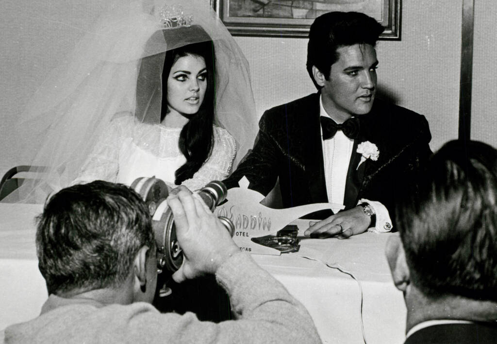 Elvis and Pricilla Presley on their wedding day at the Aladdin hotel and casino on the Las Vega ...