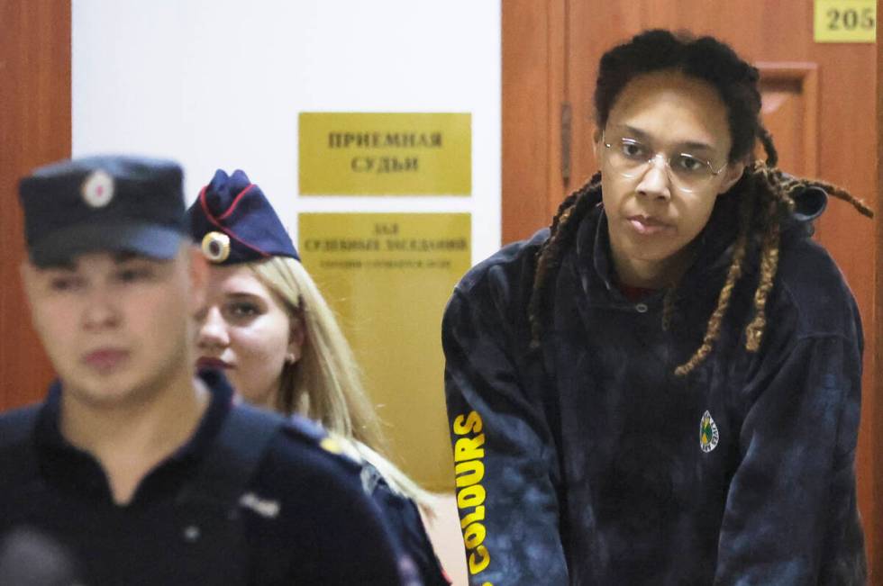 WNBA star and two-time Olympic gold medalist Brittney Griner is escorted to a courtroom for a h ...