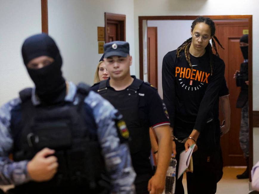 WNBA star and two-time Olympic gold medalist Brittney Griner is escorted to a courtroom for a h ...