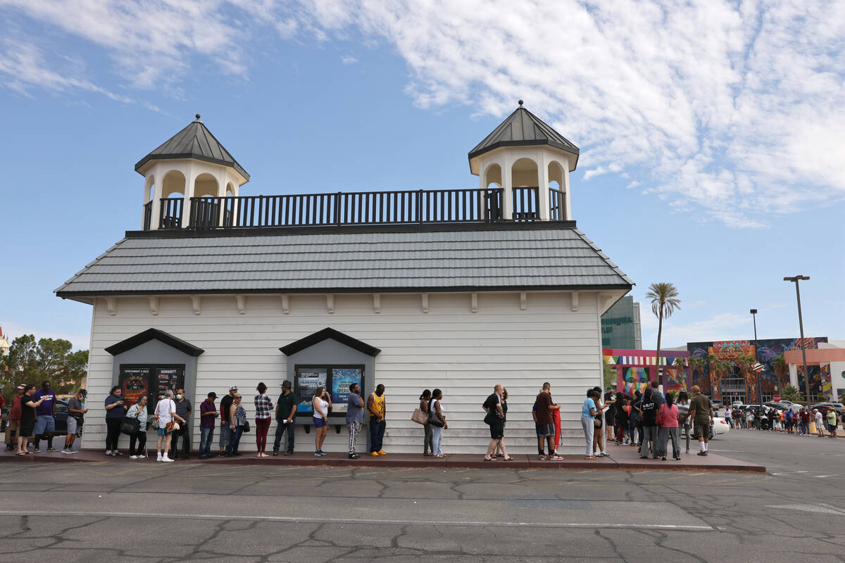 People line up for lottery tickets at the Primm Valley Lotto Store on the Nevada-California bor ...