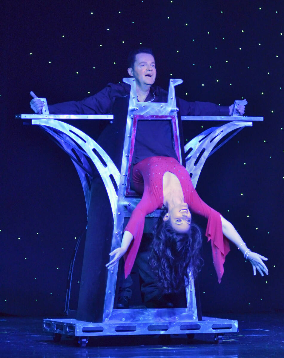 Magician Dirk Arthur, top, performs with dancer Destiny Johnson in “Dirk Arthur’s ...