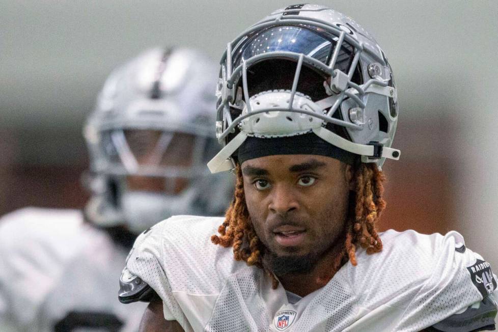 This Sept. 9, 2021, file photo, shows then-Raiders cornerback Damon Arnette (20) during team pr ...