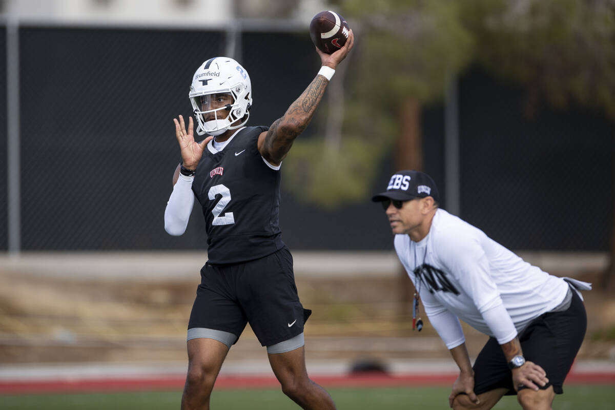 UNLV's Doug Brumfield (2) throws a pass during a team football practice at UNLV in Las Vegas, S ...
