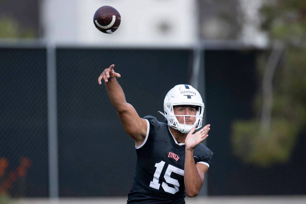 UNLV's Matthew Geeting (15) throws a pass during a team football practice at UNLV in Las Vegas, ...