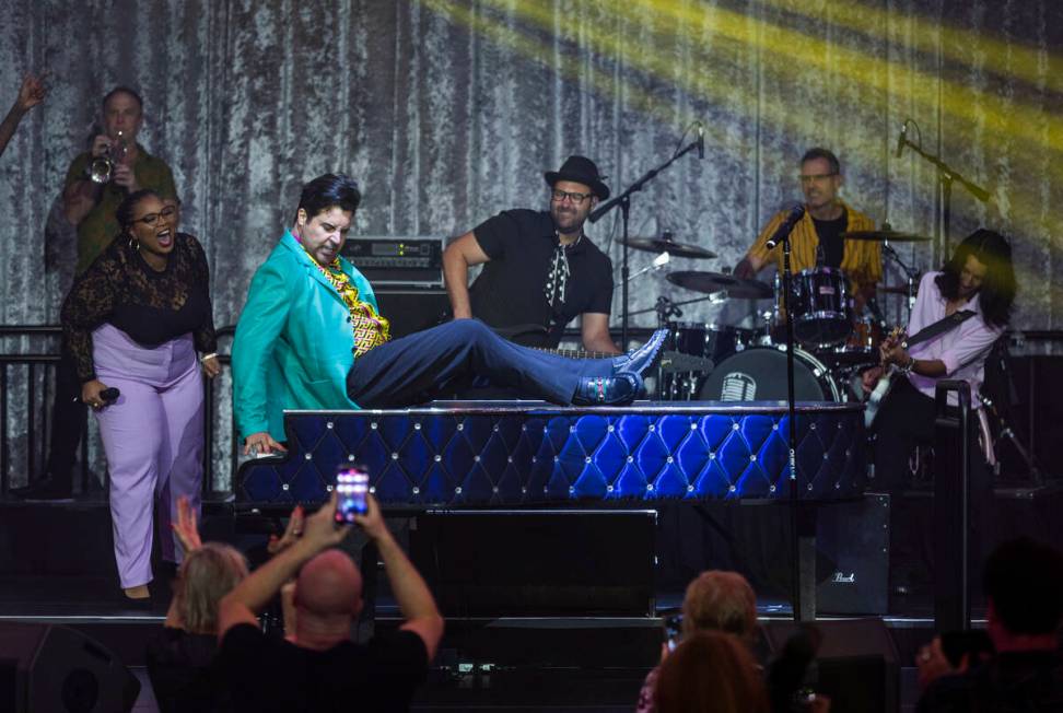 Frankie Moreno plays atop his piano during the opening night performance of his the first resid ...