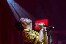 Frankie Moreno sings and plays the harmonica during the opening night performance of his the fi ...