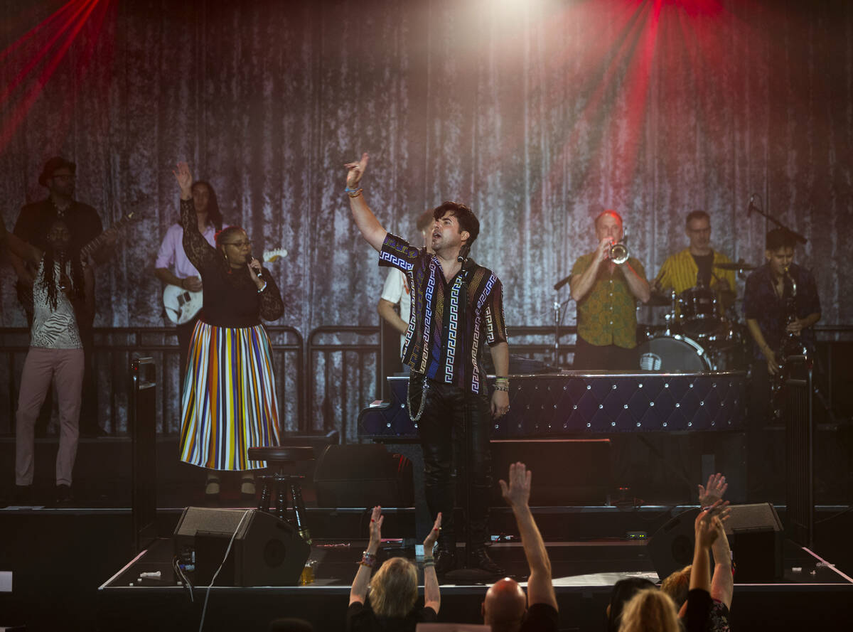 Frankie Moreno sings as his band plays during the opening night performance of his the first re ...