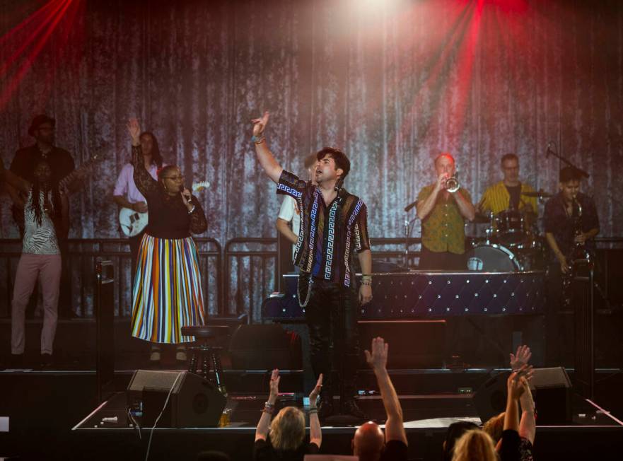 Frankie Moreno sings as his band plays during the opening night performance of his the first re ...