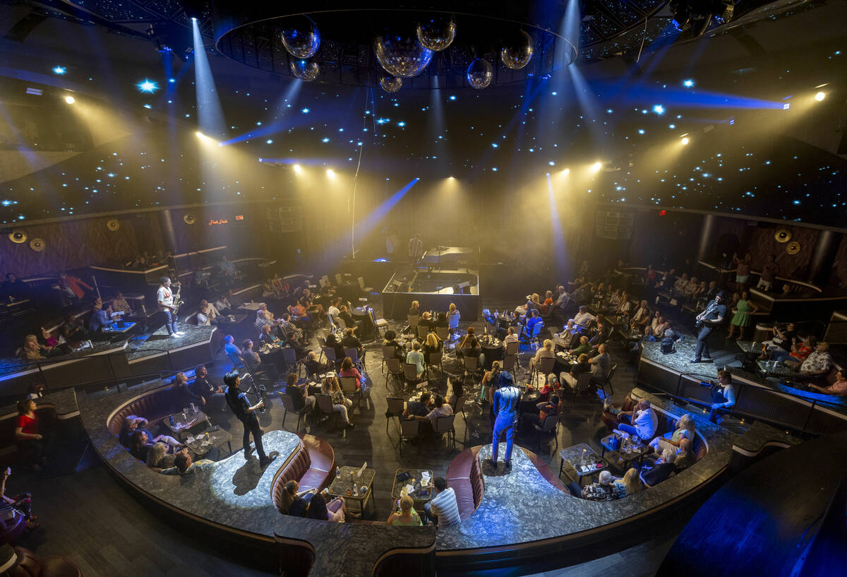 Frankie Moreno sings as his band plays during the opening night performance of his the first re ...