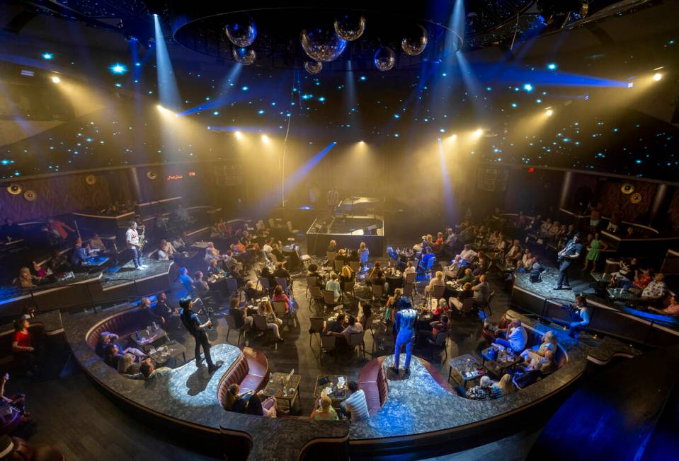 Frankie Moreno sings as his band plays during the opening night performance of his the first re ...