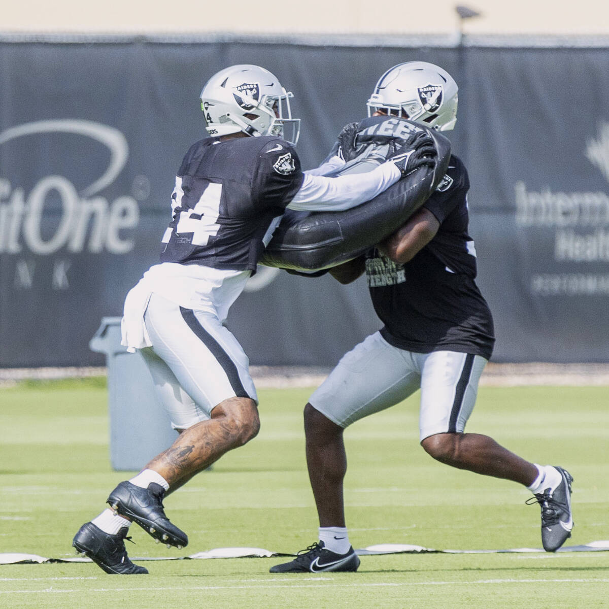 Raiders safety Johnathan Abram (24) drills with safety Duron Harmon (30) during the team&#x2019 ...