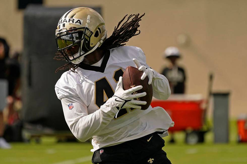 New Orleans Saints running back Alvin Kamara runs through drills during training camp at their ...