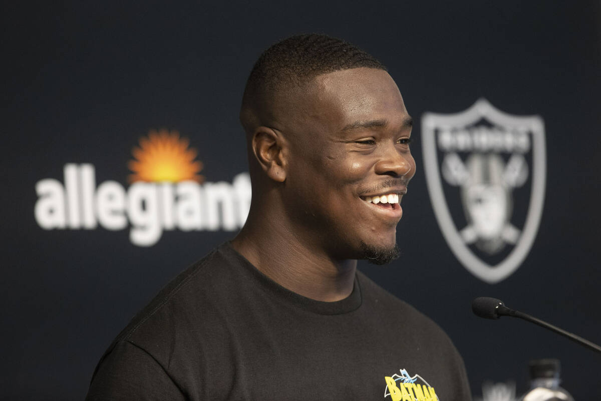 Raiders linebacker Jayon Brown laughs during a news conference after the team’s training ...