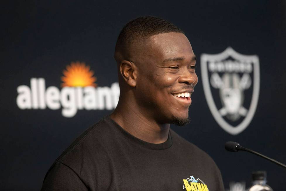 Raiders linebacker Jayon Brown laughs during a news conference after the team’s training ...