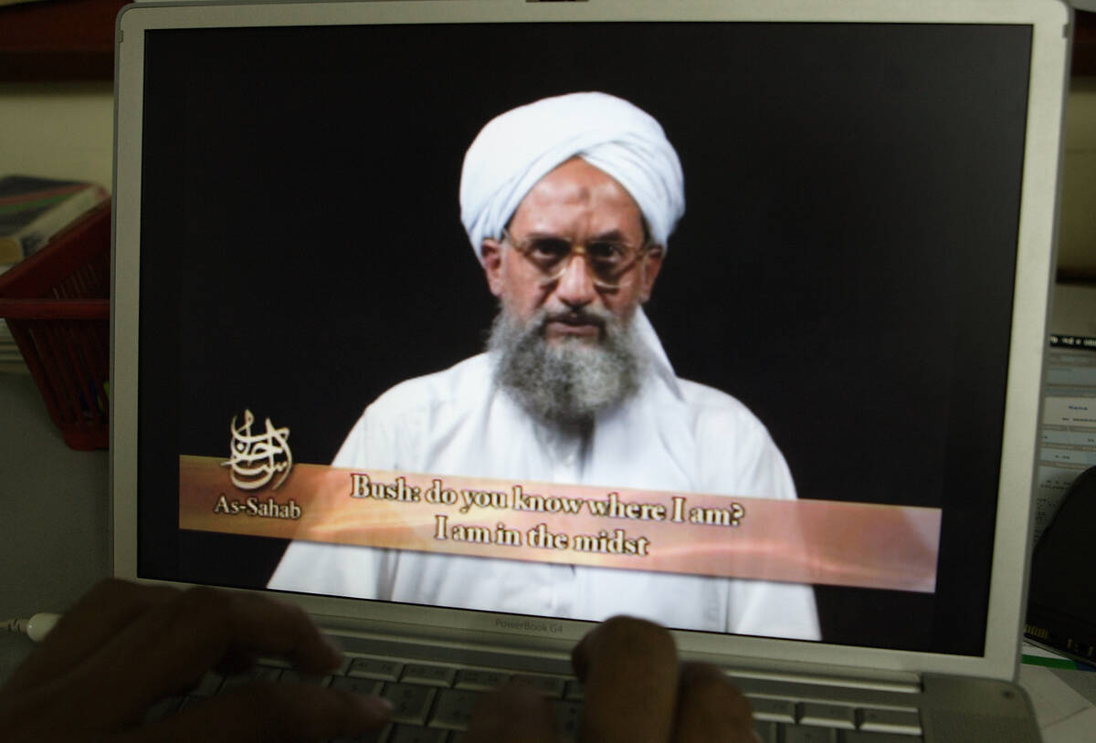 As seen on a computer screen from a DVD prepared by Al-Sahab production, al-Qaida's Ayman al-Za ...