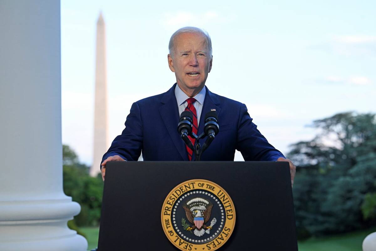 President Joe Biden speaks from the Blue Room Balcony of the White House Monday, Aug. 1, 2022, ...