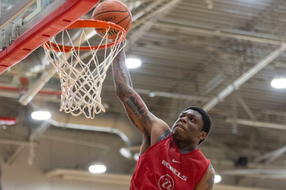 UNLV's Karl Jones (22) goes up for a dunk during a team basketball practice at Mendenhall Cente ...