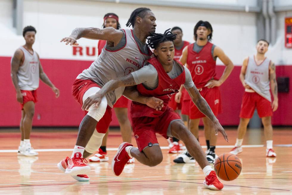 UNLV's Shane Nowell (3) defends against Keshon Gilbert (10) during a team basketball practice a ...