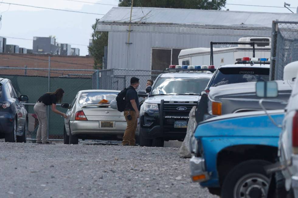 A Las Vegas police investigate around the 3000 block of Betty Lane, Tuesday, Aug. 2, 2022, in L ...