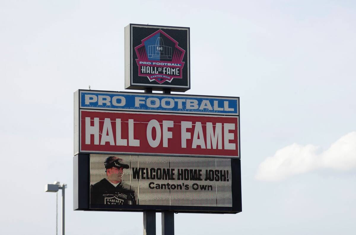 Signage welcoming Raiders coach Josh McDaniels home is seen near the entrance to the Pro Footba ...