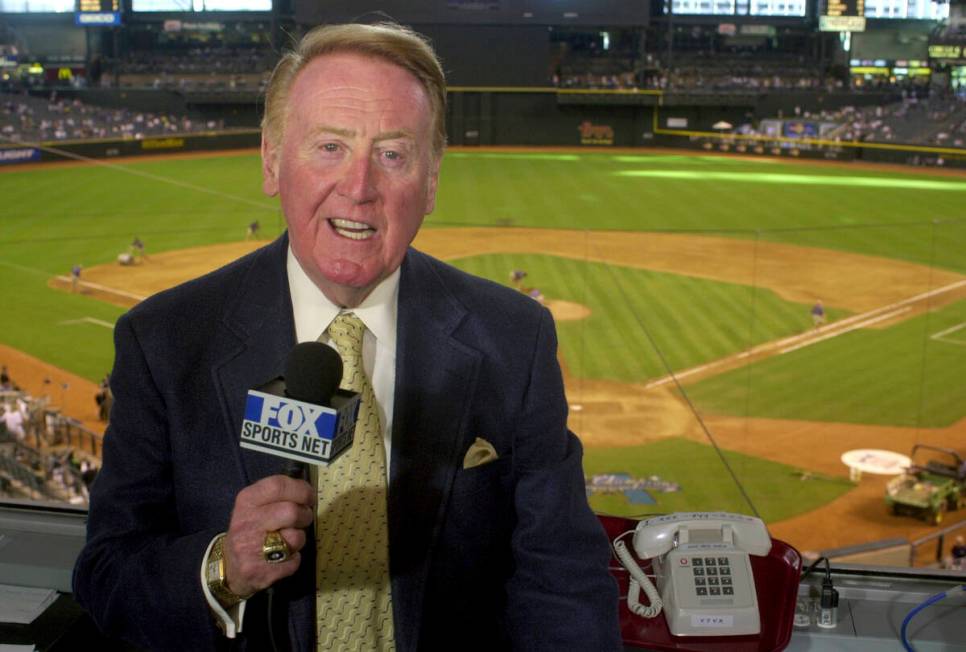 Vin Scully rehearses before a game between the Dodgers and the Arizona Diamondbacks in Phoenix ...