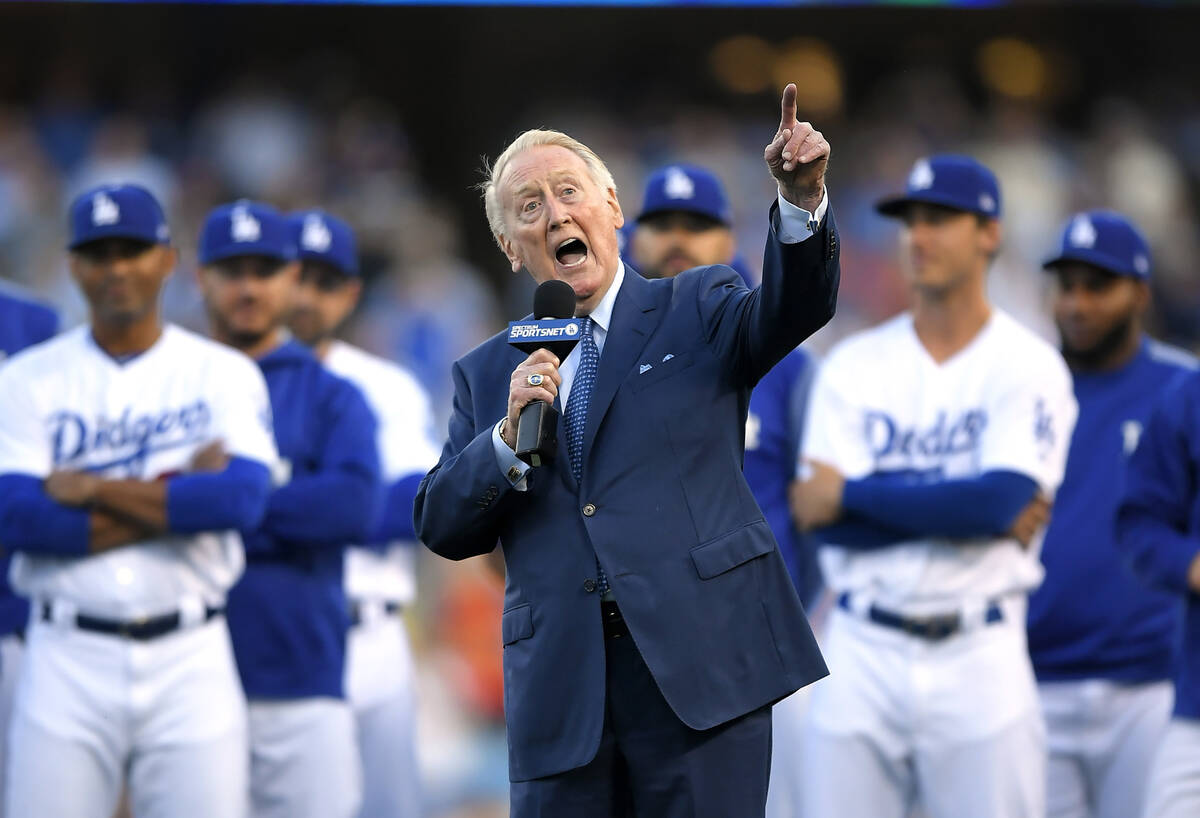 Vin Scully speaks during his induction into the Dodger's Ring of Honor prior to a game between ...
