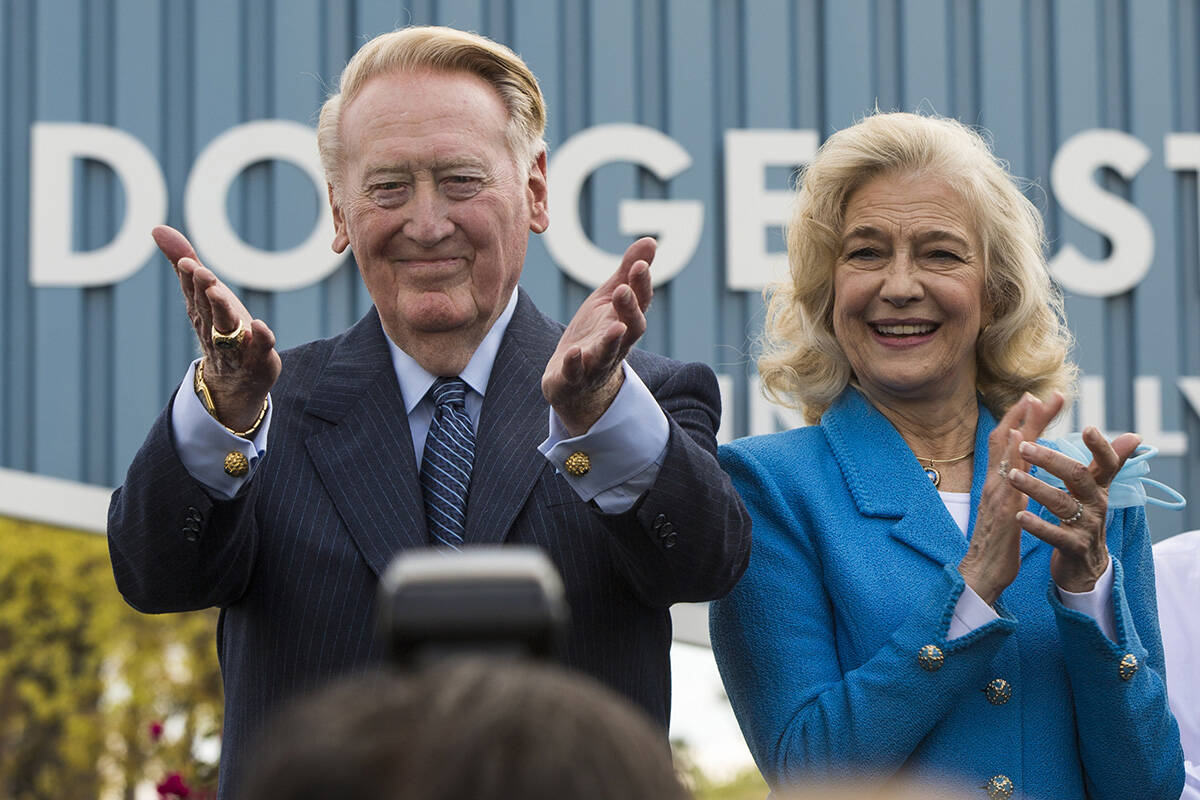 Vin Scully, left, with his wife, Sandra Scully, thanks Dodgers' fans at a dedication ceremony u ...
