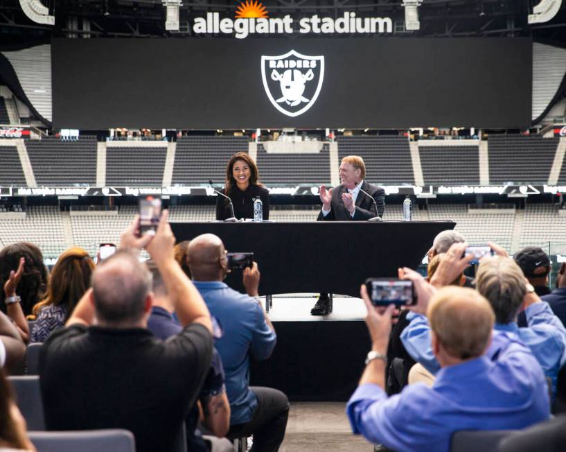 Raiders owner Mark Davis claps after announcing Sandra Douglass Morgan as the new president of ...
