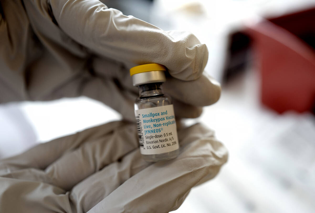 Registered pharmacist Sapana Patel holds a bottle of Monkeypox vaccine at a Pop-Up Monkeypox va ...