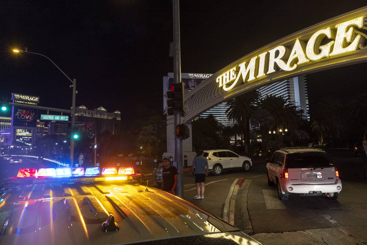 Cars begin to enter The Mirage after Metropolitan police blocked off the area due to a fatal sh ...