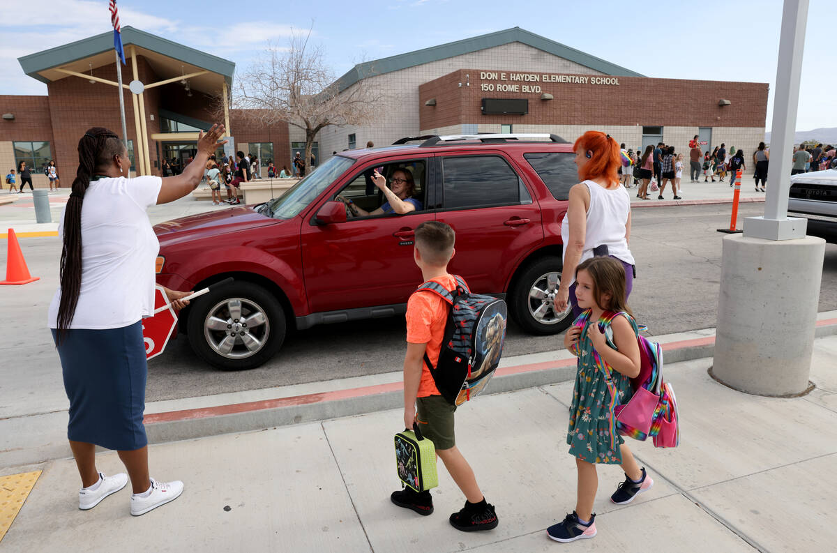 Students arrive for the first day of the school year at Hayden Elementary School in Las Vegas o ...