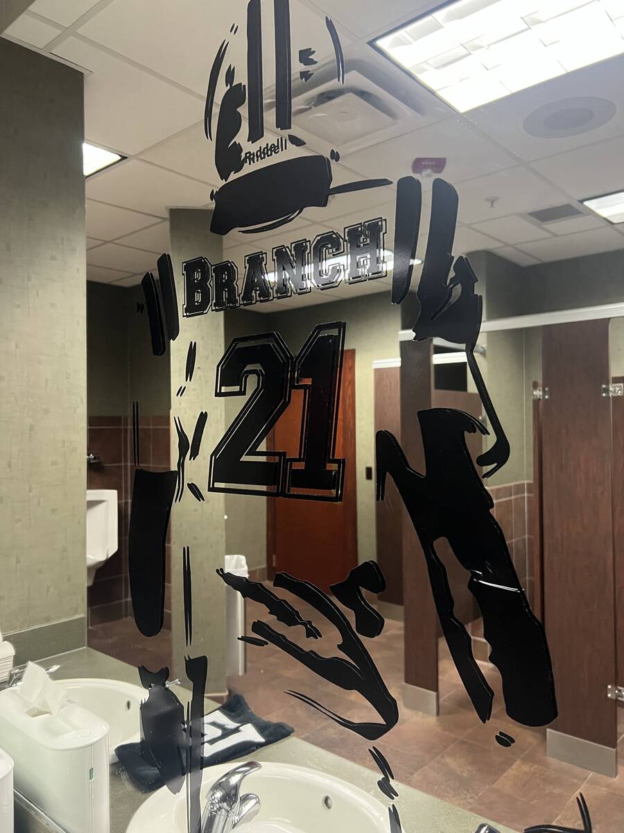 A men's room mirror is shown at the Raiders' party honoring Cliff Branch at Quarry Gold Club in ...