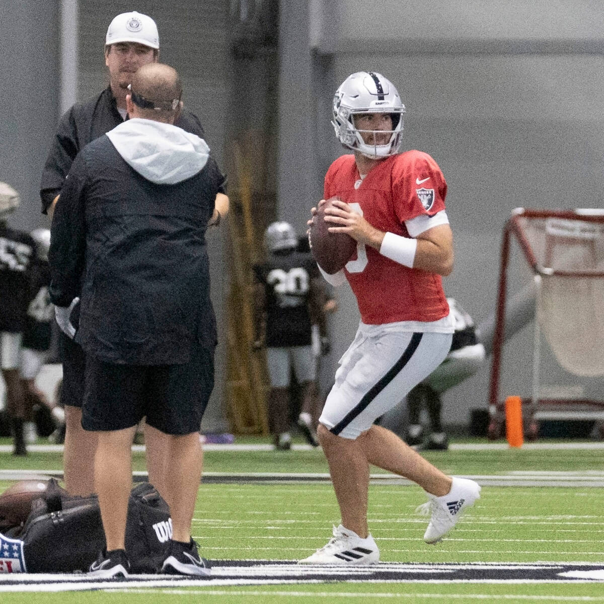Raiders quarterback Jarrett Stidham (3) prepares to throw during the team’s training cam ...