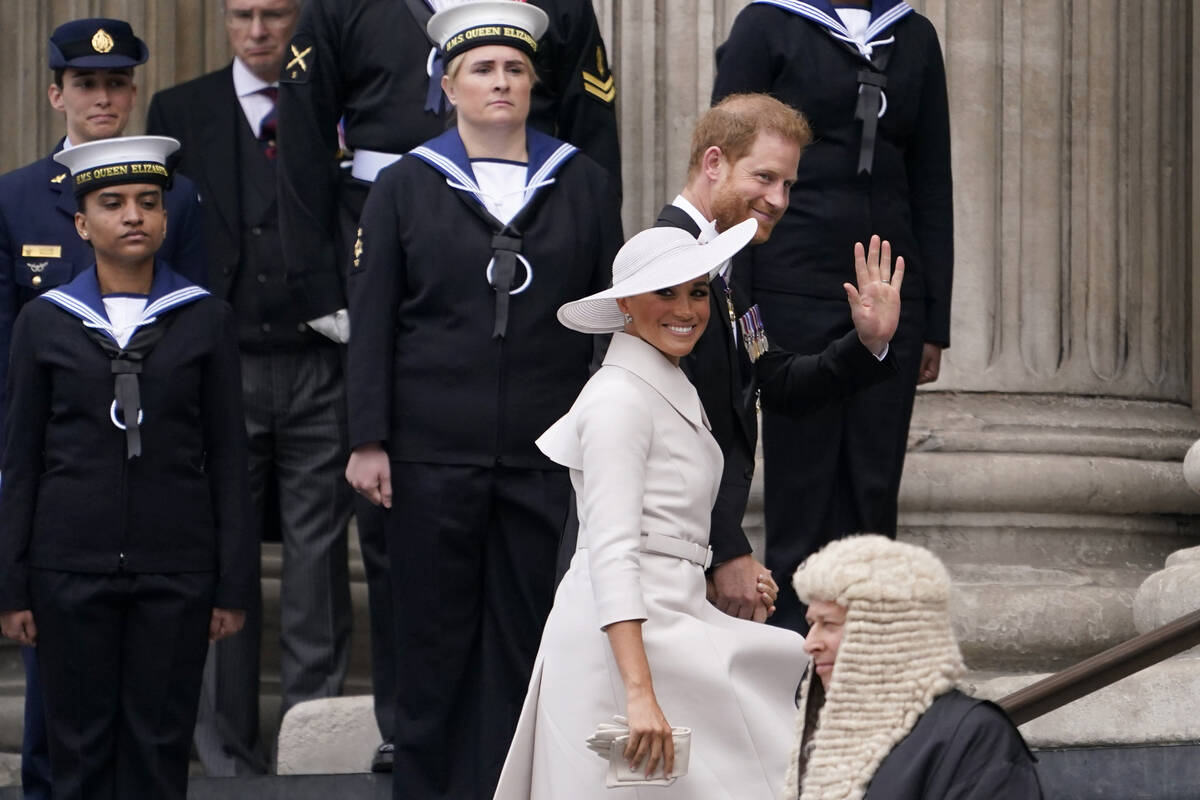 Prince Harry and his wife Meghan, Duchess of Sussex, arrive for a service of thanksgiving for t ...