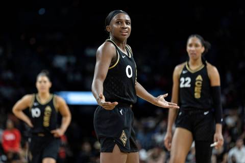 Las Vegas Aces guard Jackie Young (0) reacts to a referee after they called a foul on her durin ...