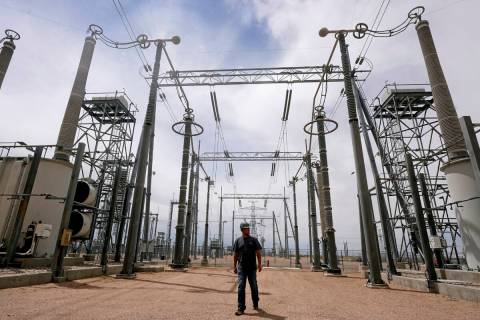 Cecil Crow walks through an electricity substation at Intermountain Power Plant on Wednesday, J ...