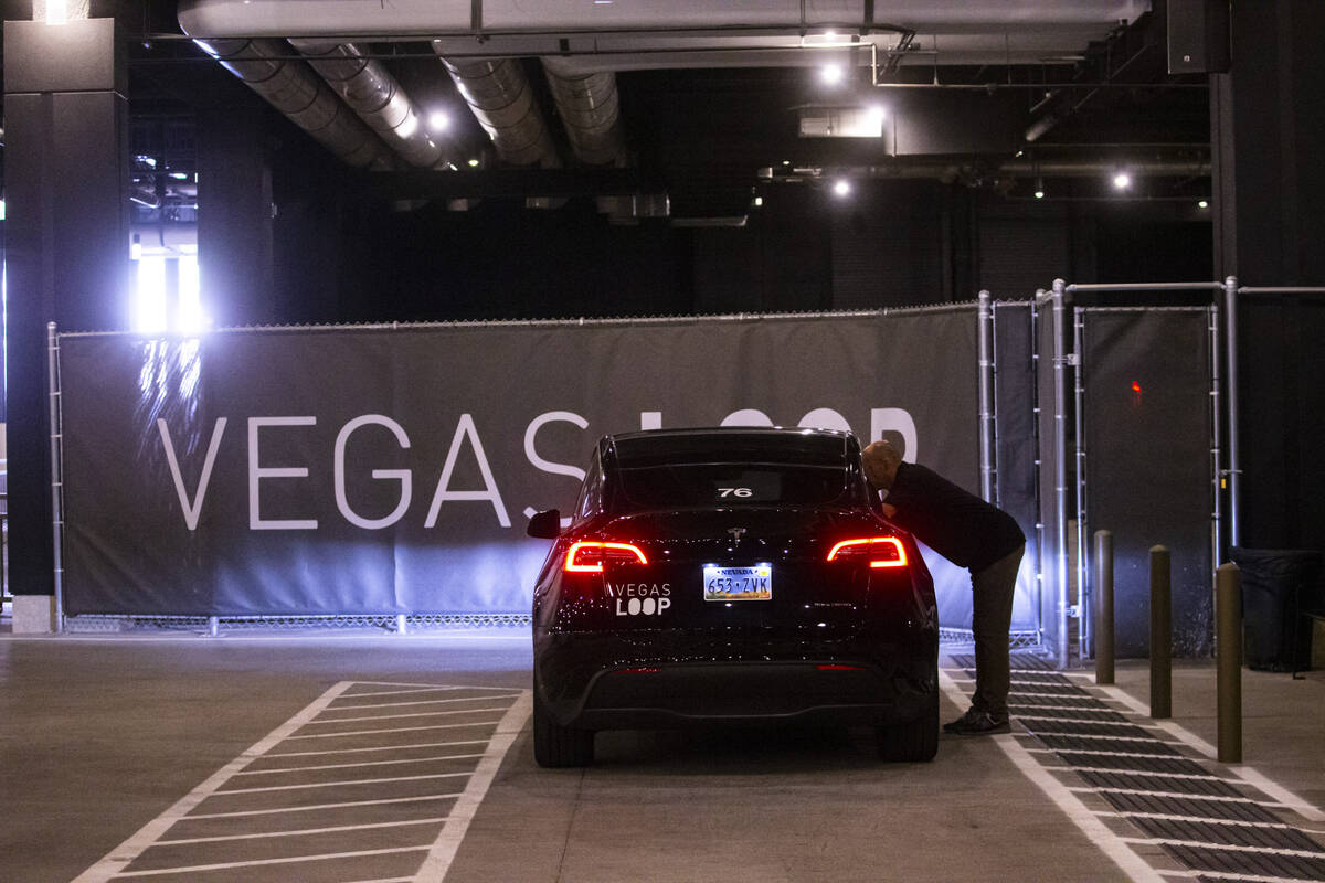 A Vegas Loop Tesla prepares to depart from the Boring tunnel passenger station at Resorts World ...