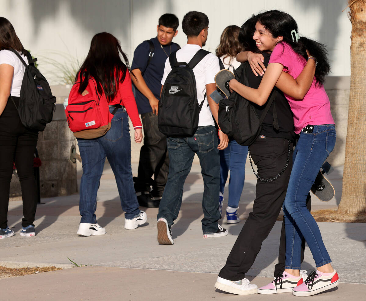 Students arrive at a single point of entry for the first day of the school year at Eldorado Hig ...