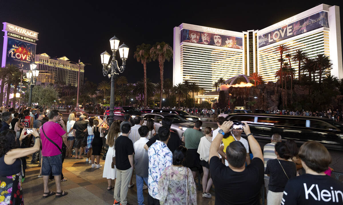 Crowds gather to watch the fire show at Mirage on the Las Vegas Strip, Tuesday, Aug. 2, 2022. ( ...