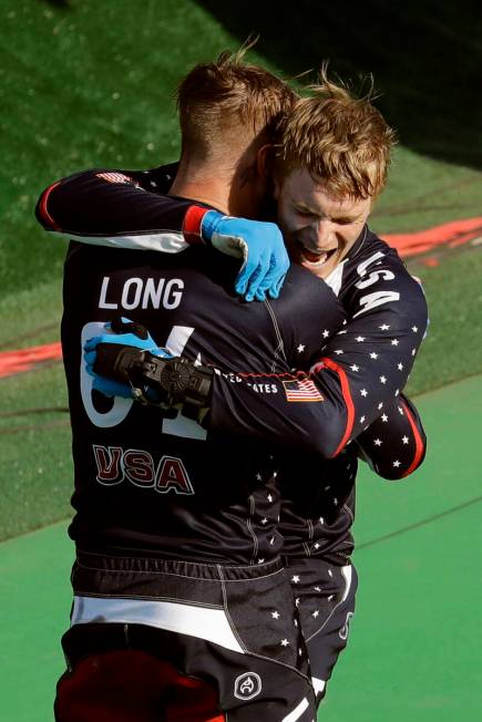 First place Connor Fields, right, celebrates with fourth place Nicholas Long, both of the Unite ...